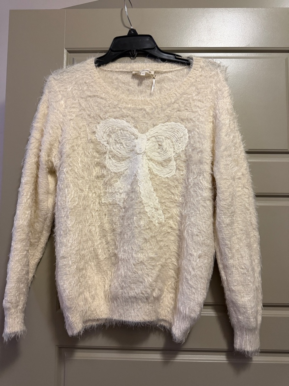 Cozy Cream Fuzzy Sweater with Bow + pearl Detail